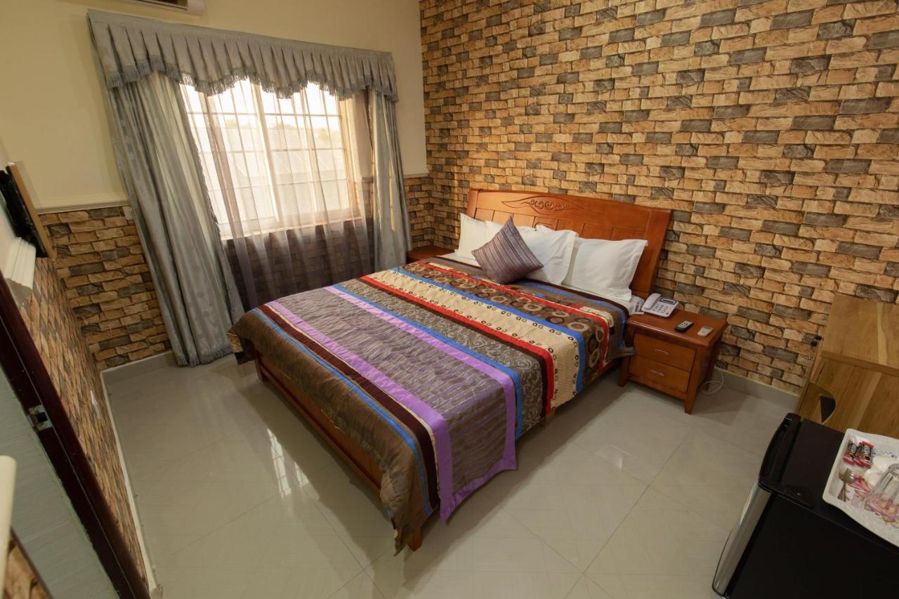 Ag Hotel And Suites Ogbodjo Екстериор снимка